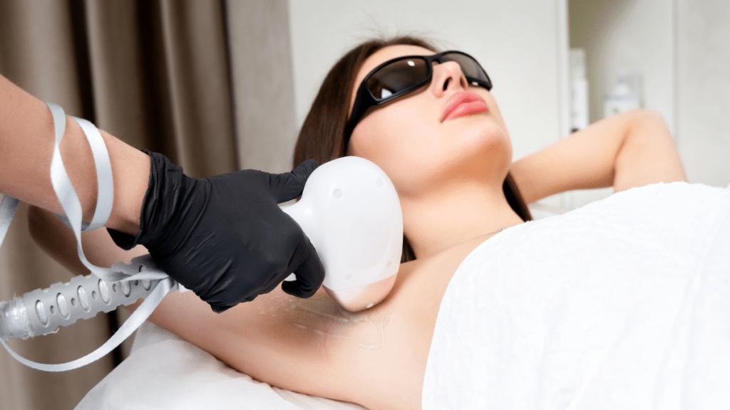 Woman receiving laser hair removal treatment & wondering is Laser hair removal permanent
